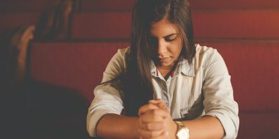 praying woman inside church